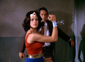 Wonder Girl protects Peter Knight
