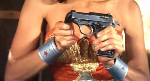 Wonder Woman bends a gun. Not a metaphor for anything.